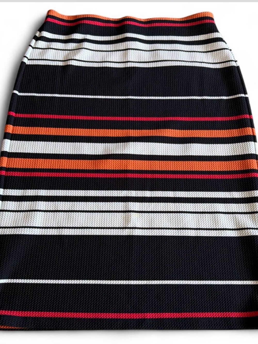 Women’s stretch midi pencil skirt by NYCC in a multi-color stripe . Size small